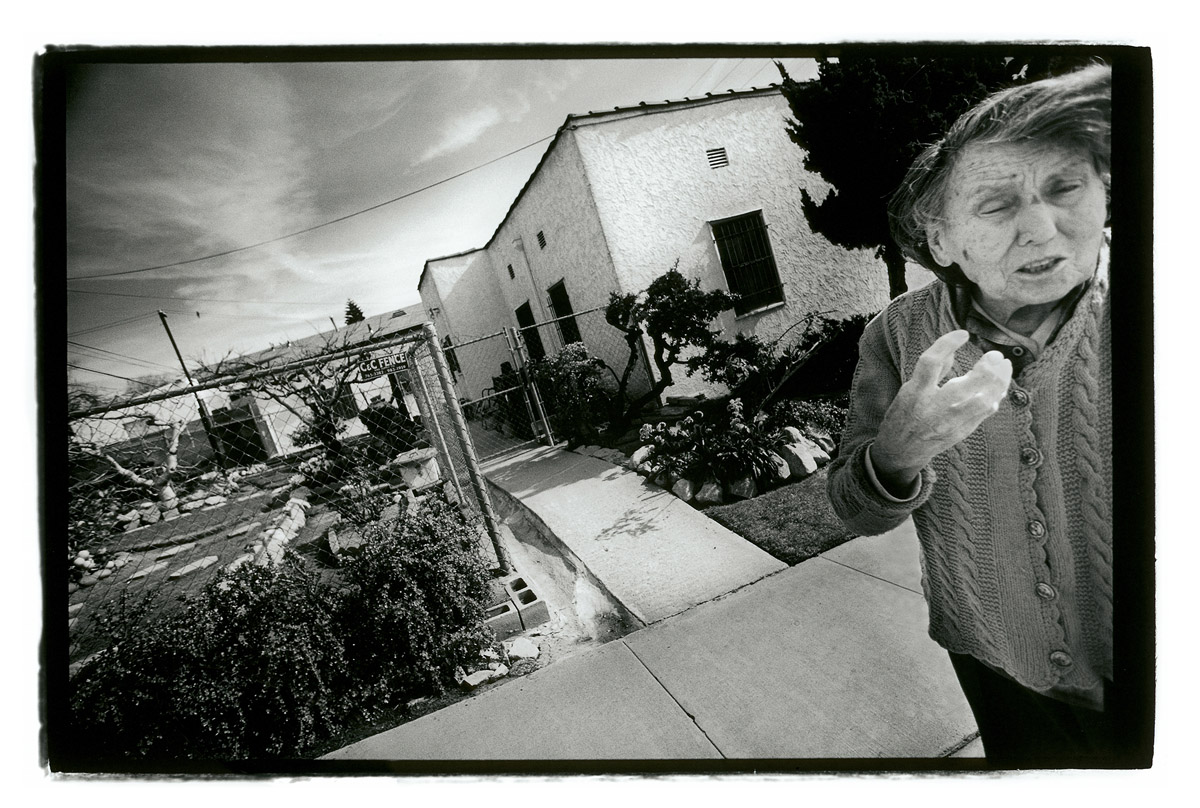 Lucille X in front of the house her father bought in 1930
