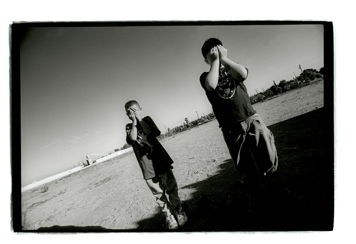 Ryan X and Joel X out vandalizing the construction equipment that was transforming the last open field in their neighborhood into a set of industrial buildings
