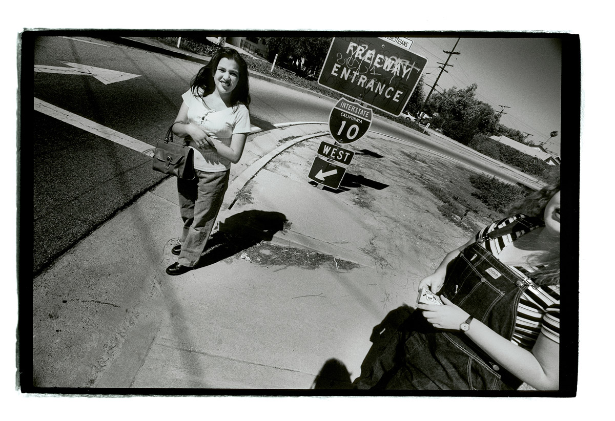 Two girls came over to explain why New Avenue at the San Bernardino Freeway is covered in graffiti