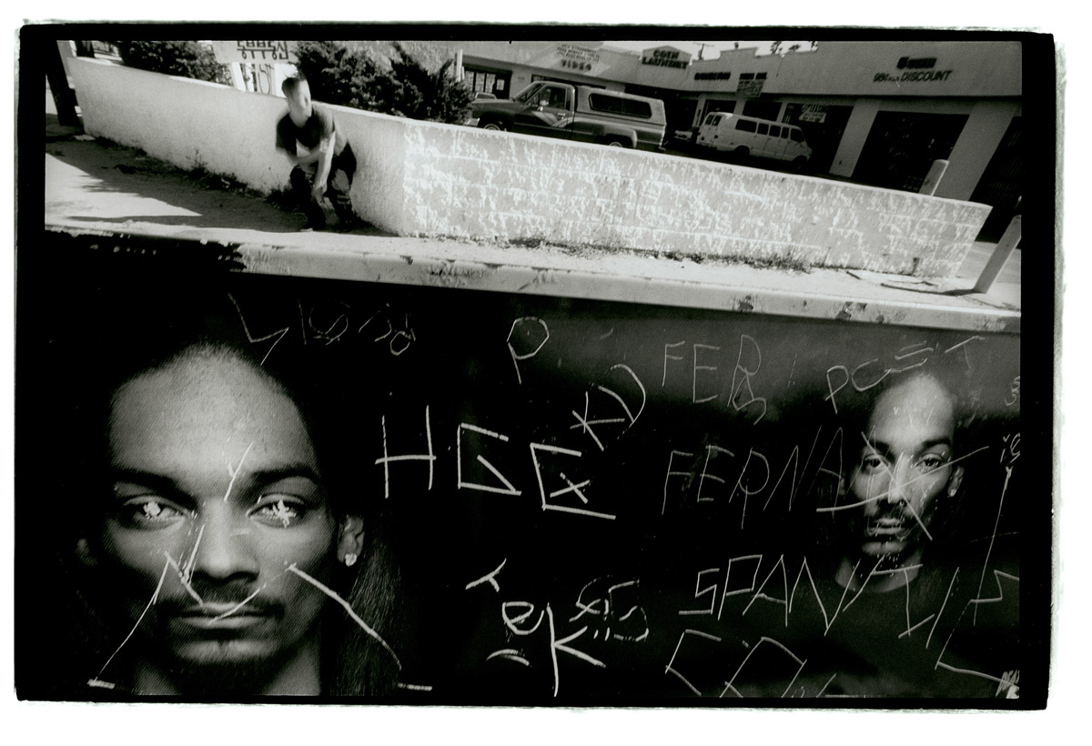 Somebody had scratched out Snoop Doggy Dog's eyes